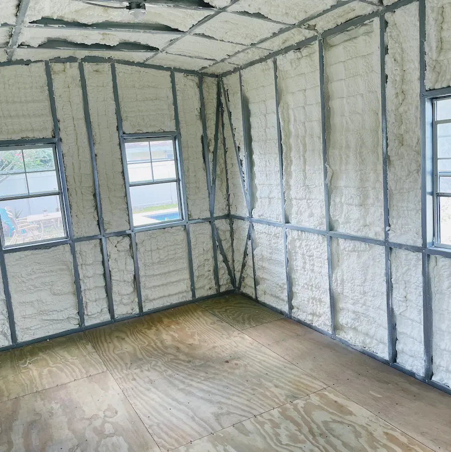 Closed-cell spray foam insulation applied to wall cavities in a residential project in Westbrook